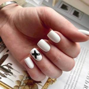 White manicure with black design