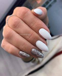 White manicure with silver sparkles