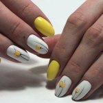 White manicure with yellow