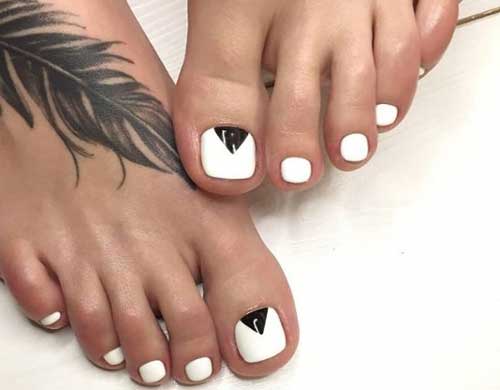 White pedicure 2022 with geometric shapes