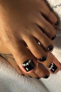 Black and white pedicure with beads