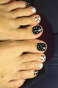 Black and white polka dot pedicure