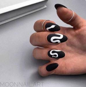 Black nails with snake