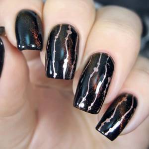 black manicure with glitter
