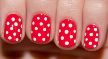 Children&#39;s manicure with polka dots
