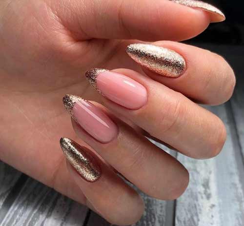 Long nails decorated with sparkles, French