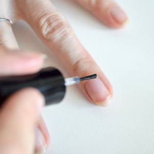 European manicure step 9 - applying cuticle oil