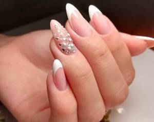 French on almond-shaped nails with design