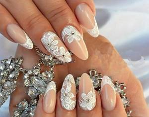 French on almond-shaped nails: new items for 2022. Design with rhinestones, sparkles, rubbing, gel polish pattern