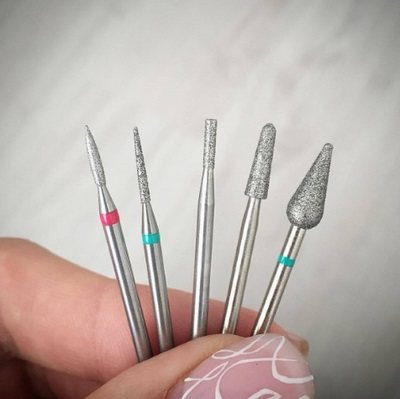 Cutters for hardware manicure. Types with descriptions and photos, which ones are used for what: ceramic, diamond, corundum, carbide. Purpose, how to sterilize, process for beginners 