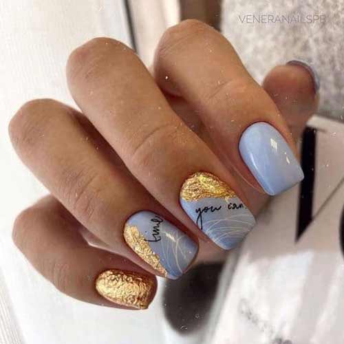 Blue nail color and gold leaf