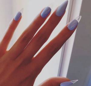 Blue transparent manicure on sharp nails