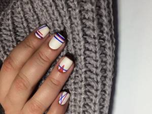 Graphic manicure on a white basis