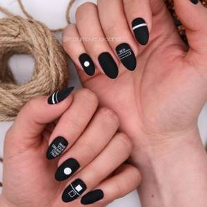 Exquisite black manicure 2022-2023: main trends and new items of the season