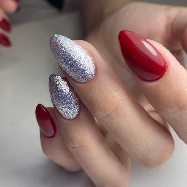 Red and silver glitter manicure almond