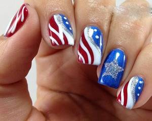Red and blue manicure with flags