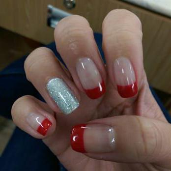 Red French nail design: photo of a stylish manicure