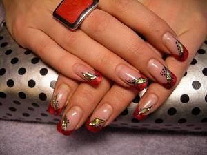 Red French nail design: photo of a stylish manicure