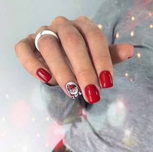 Red manicure and design on one nail
