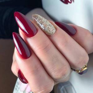 Red manicure extended on forms
