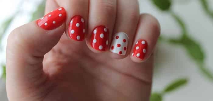 Red manicure with dots