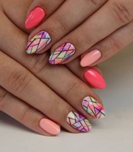 Light summer manicure in delicate pink colors, watercolor and geometry techniques.