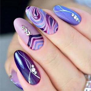 lilac manicure with abstraction