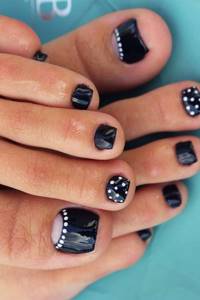 Lunar black and white pedicure