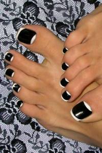 Lunar French in black and white pedicure