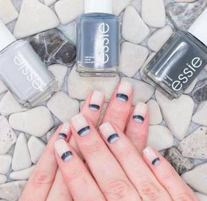 moon manicure in shades of gray