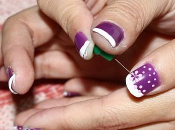 Manicure with a needle