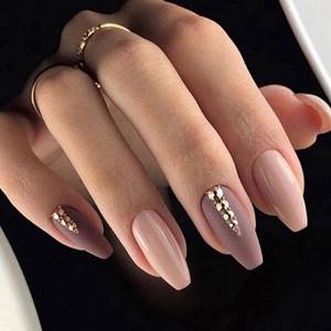 pink manicure with silver and rhinestones