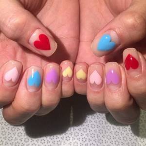 manicure with colored hearts