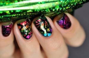 Manicure with pieces of colored foil