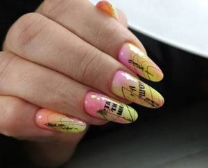 Manicure with inscriptions and gradient