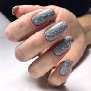 Manicure with cobwebs for New Year 2021