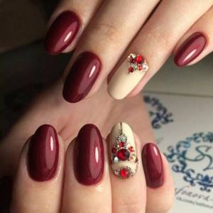 Manicure with rhinestones for New Year 2021