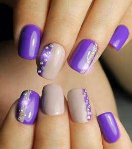 Manicure in purple color