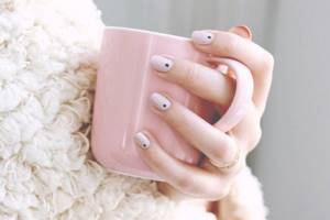 Minimalist manicure with black dots