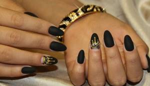 Matte black manicure with crown