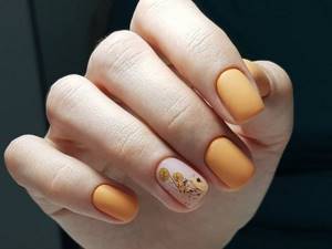 Matte mustard manicure with floral sticker designs