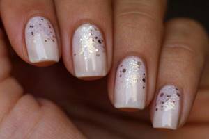 Milky manicure with glitter