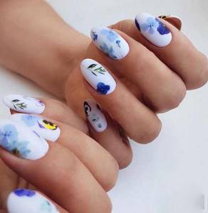 Milky manicure with stickers