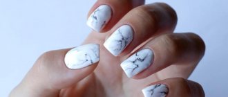 White marble manicure with dark veins