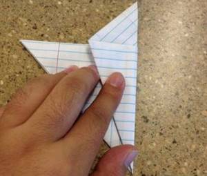 A triangle is drawn on paper with the same height as