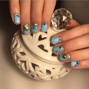 Nail stickers. Fashionable manicure with stickers and sliders 