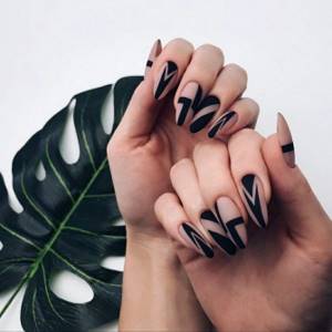 Unusual geometry manicure on almond shaped nails.