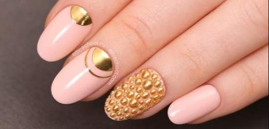Unusual manicure with gold