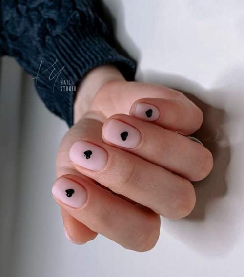 Nude manicure with hearts