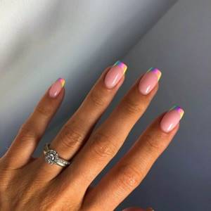 Nude extended manicure with rainbow jacket